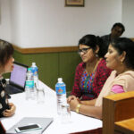 Educational counselor addressing Indian students about MBBS opportunities in China