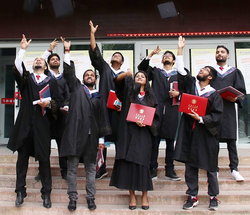 MBBS graduates at top Chinese universities wearing convocation gowns